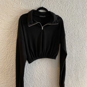 Black quarter zip top